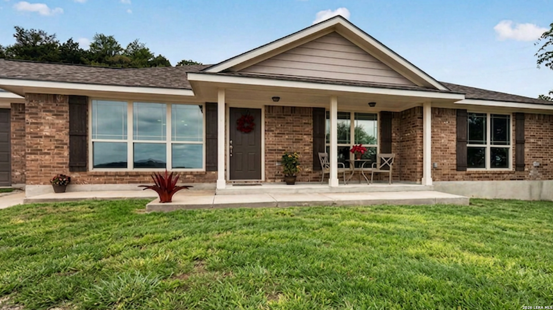 142 Harbour Vw Road Lakehills, TX 78063 - Photo 1 of 38 front view of a house with a yard