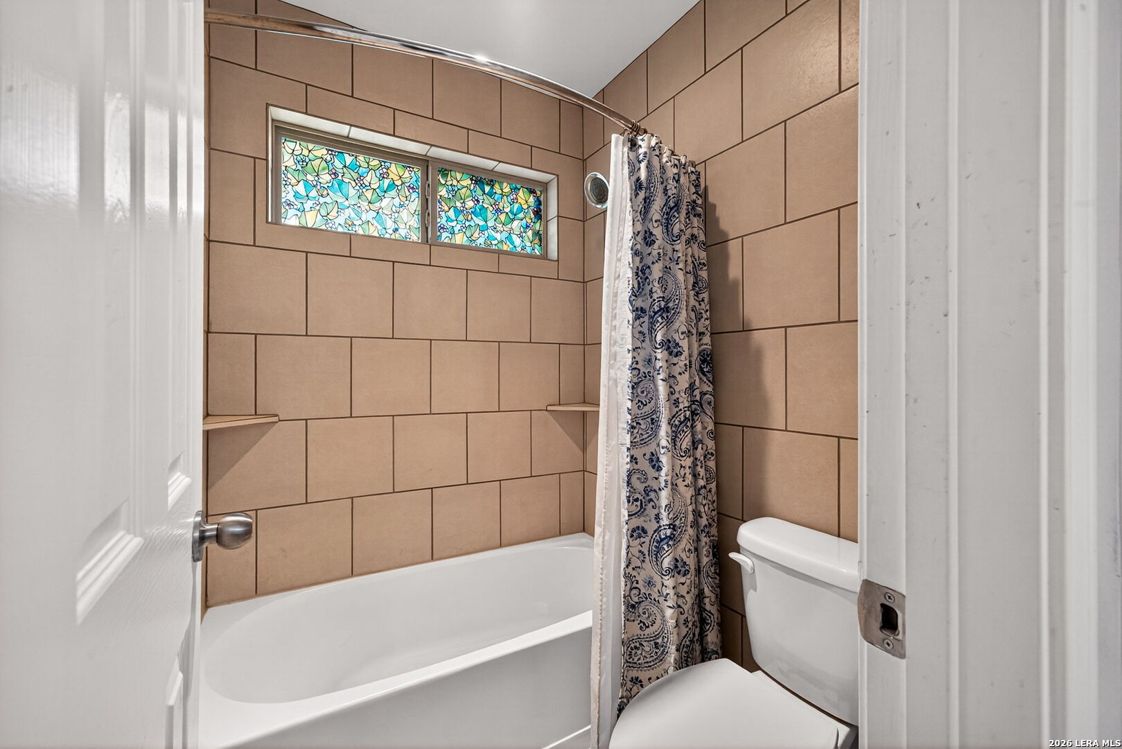142 Harbour Vw Road Lakehills, TX 78063 - Photo 21 of 38 a bathroom with a toilet and shower