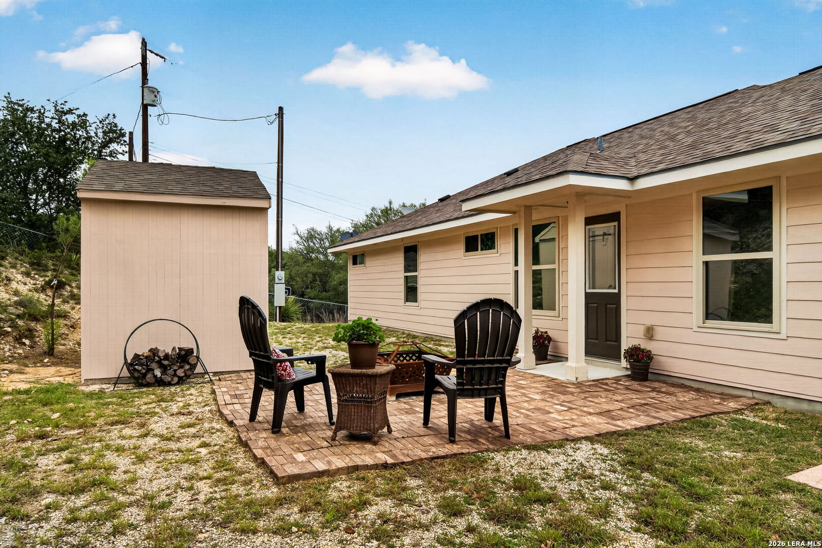 142 Harbour Vw Road Lakehills, TX 78063 - Photo 29 of 38 a view of a dinning table and chairs in patio