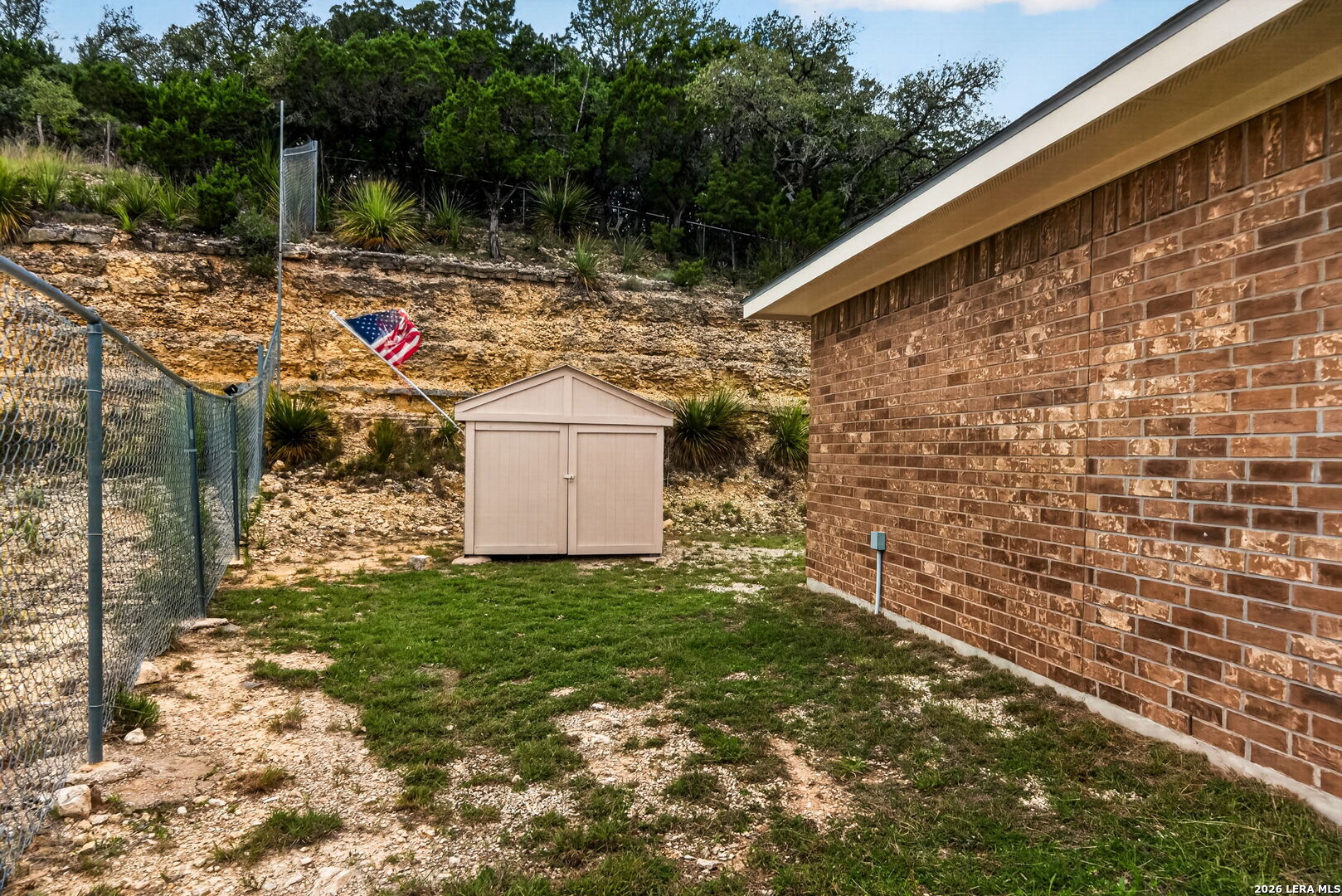142 Harbour Vw Road Lakehills, TX 78063 - Photo 31 of 38 a view of a back yard of the house