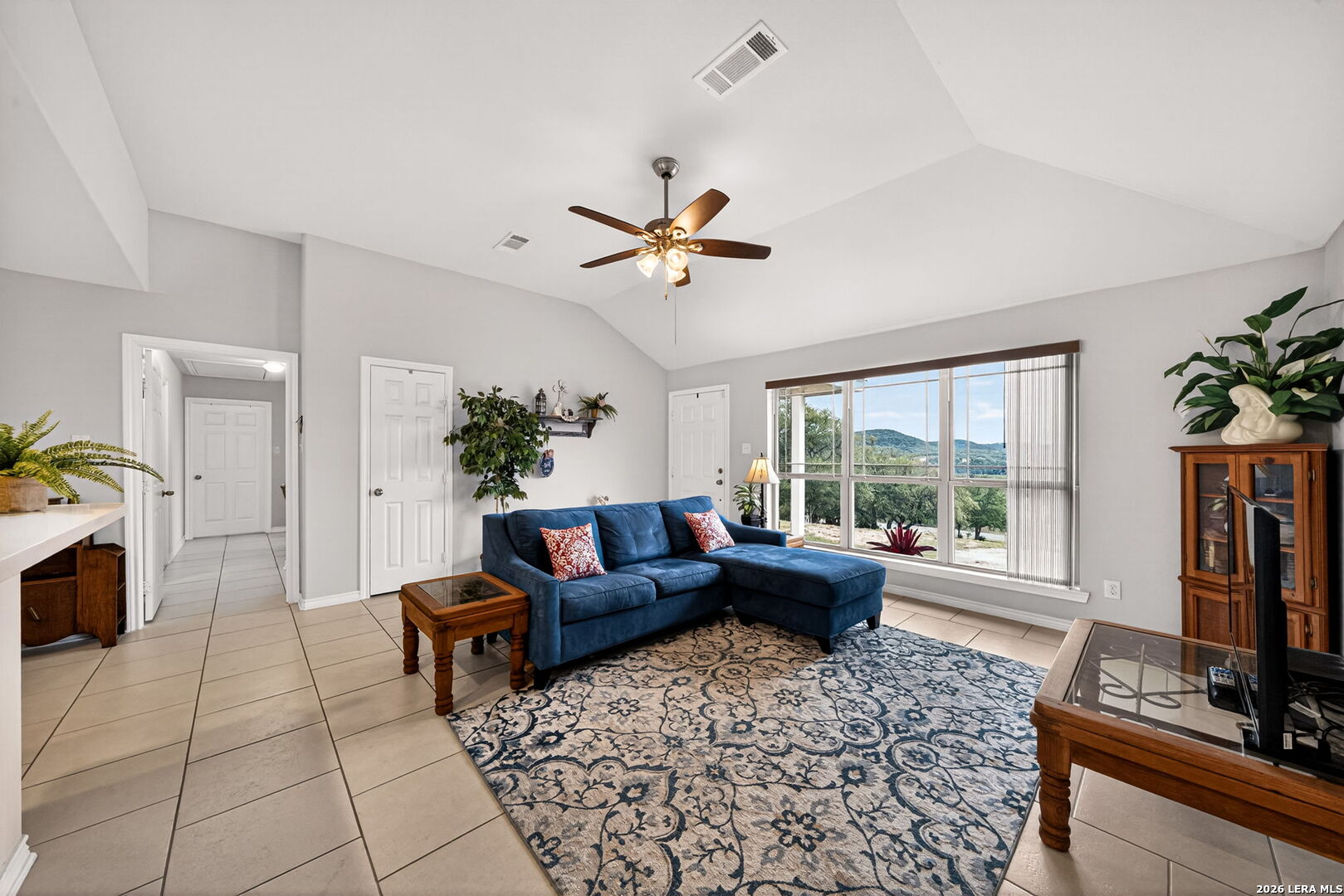 142 Harbour Vw Road Lakehills, TX 78063 - Photo 7 of 38 a living room with furniture and a window