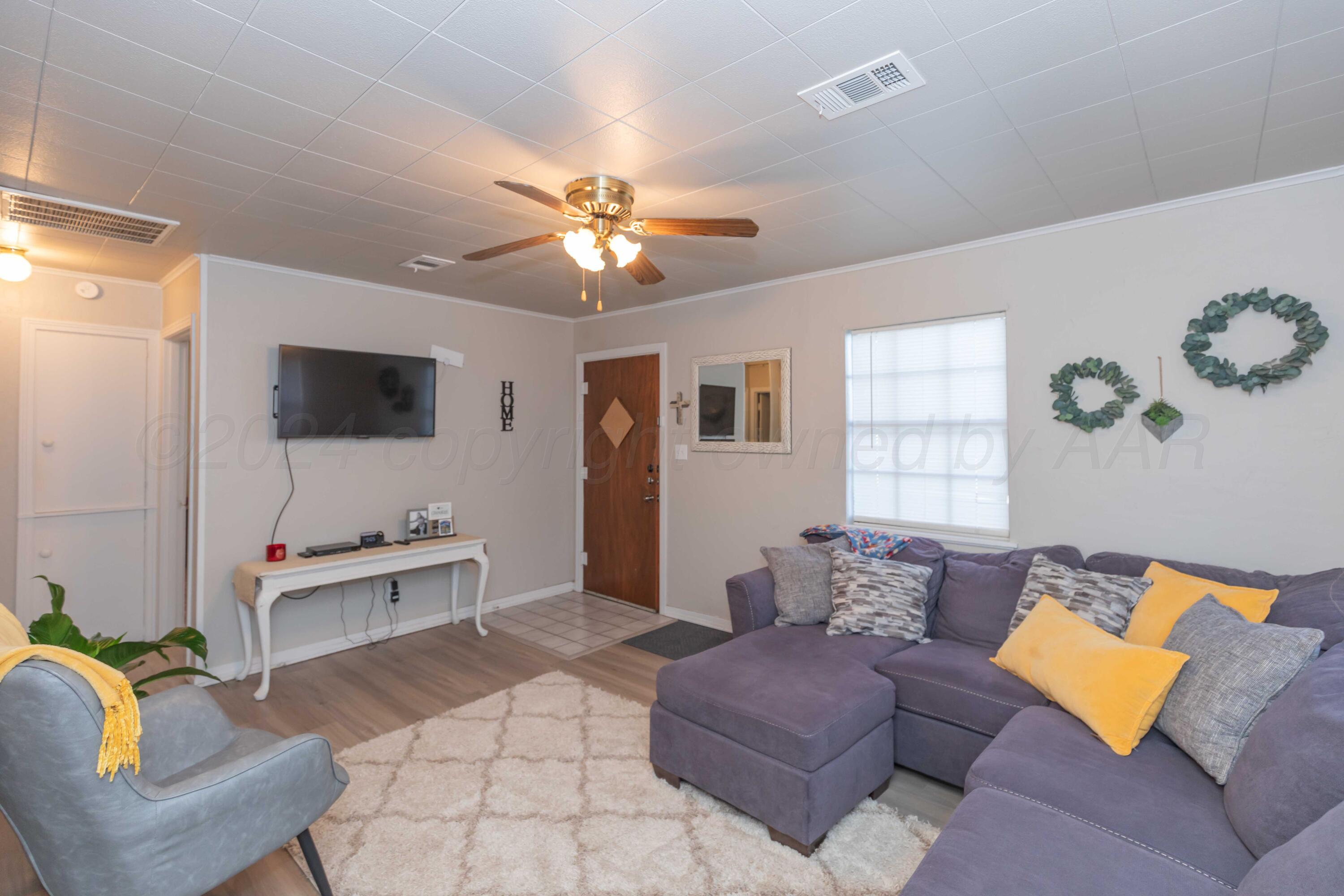 4313 Bowie Street Amarillo, TX 79110 - Photo 6 of 25 LIVING ROOM VIEW 1