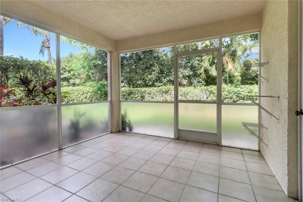 7779 Jewel Lane, Unit 103 Naples, FL 34109 - Photo 22 of 26 a view of an empty room and window