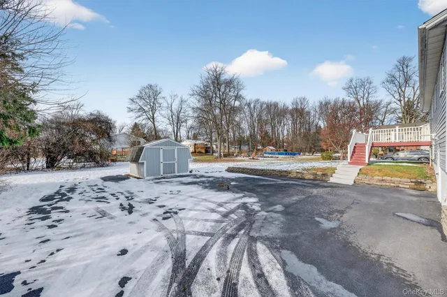 a view of road and trees