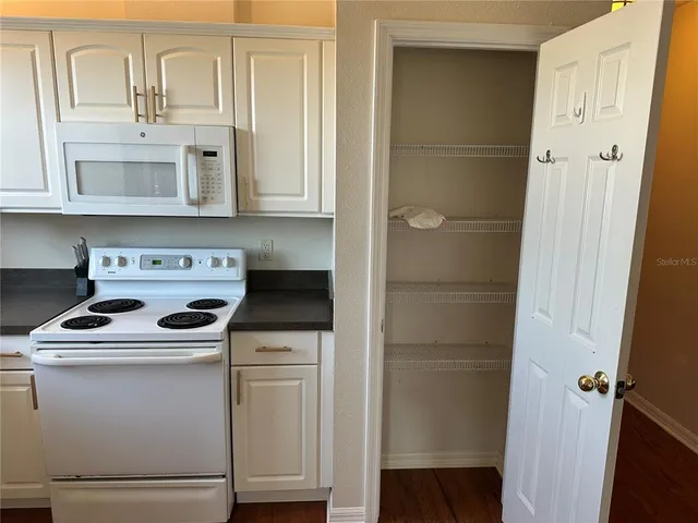 a bathroom with a sink a washer and dryer