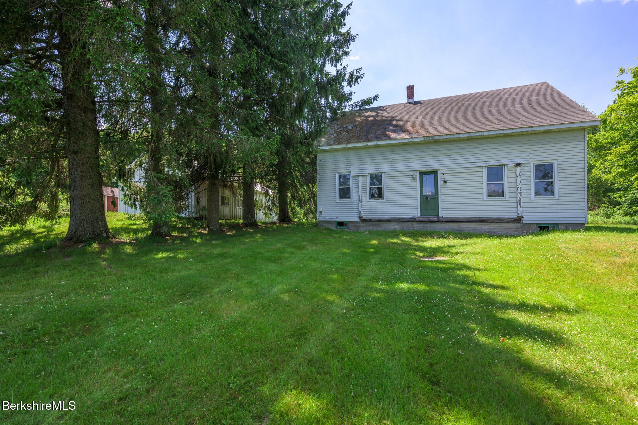 105 Norton Road Canaan, NY 12029 - Photo 1 of 10 a view of a house with a big yard