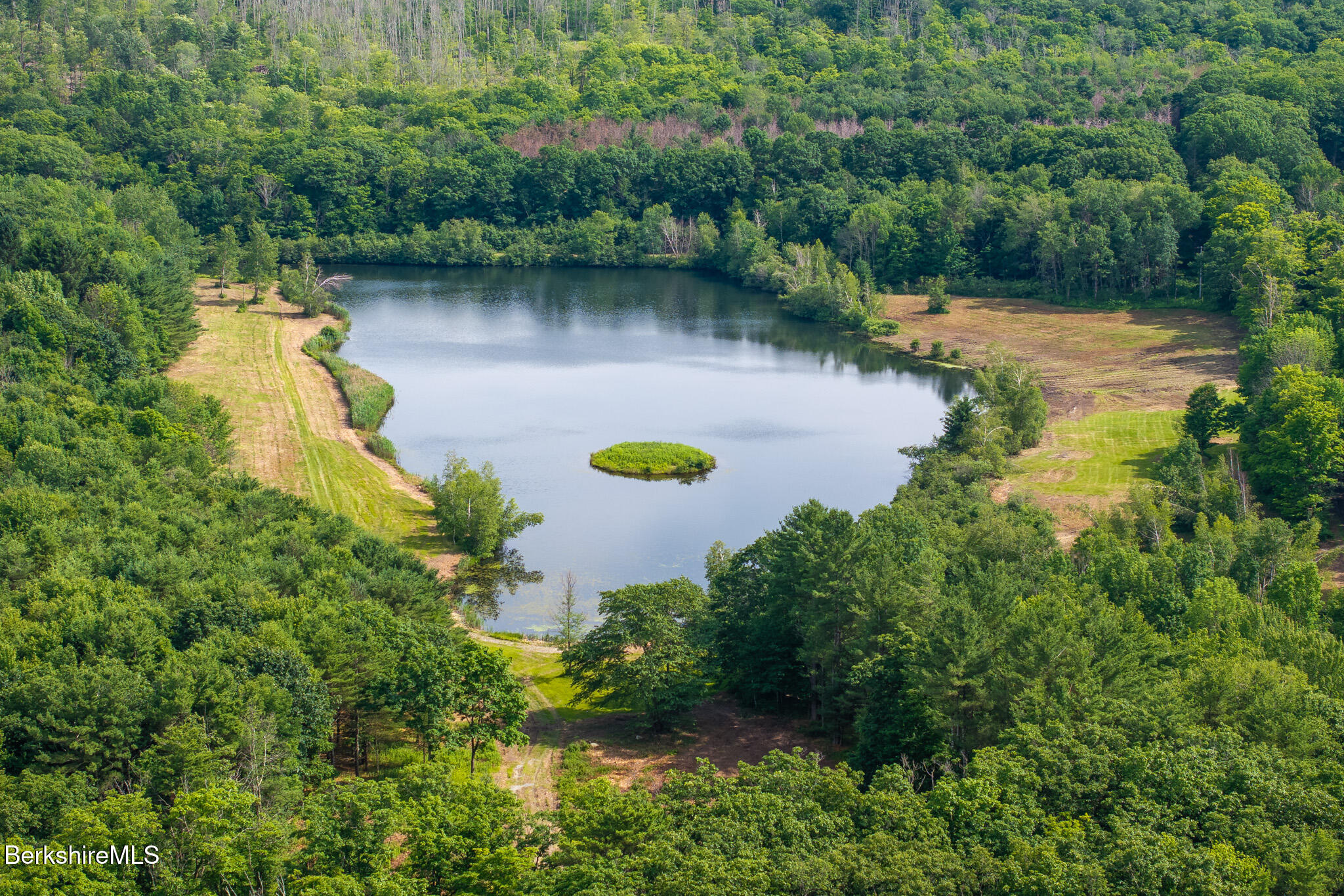 105 Norton Road Canaan, NY 12029 - Photo 5 of 10 an aerial view of a house with a yard basket ball court and outdoor seating