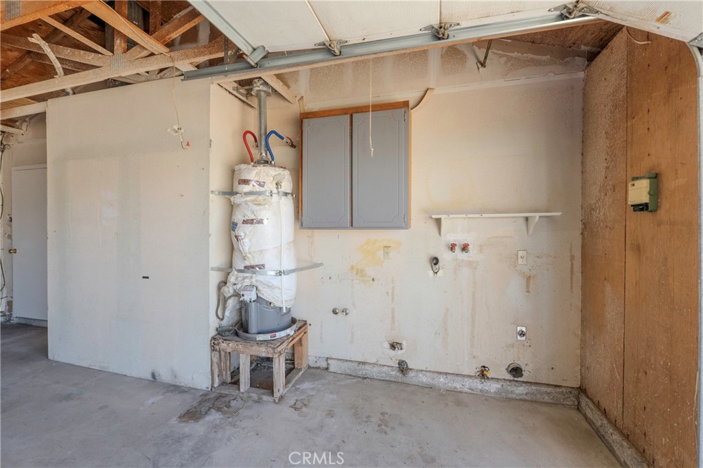 11135 Truchas Road Apple Valley, CA 92308 - Photo 26 of 35 a view of a storage & utility room with two washing machine