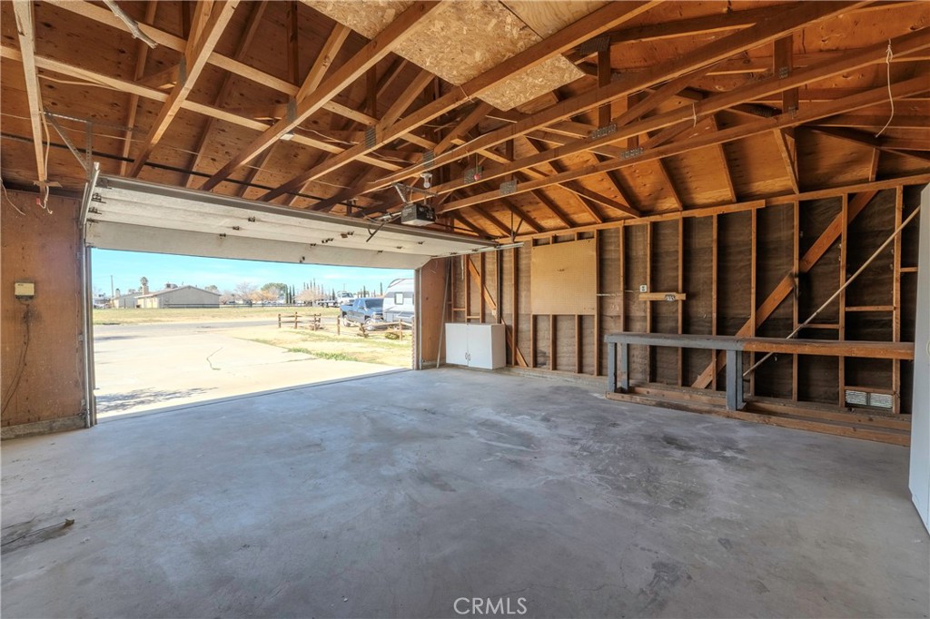 11135 Truchas Road Apple Valley, CA 92308 - Photo 28 of 35 a view of an empty room with a garage