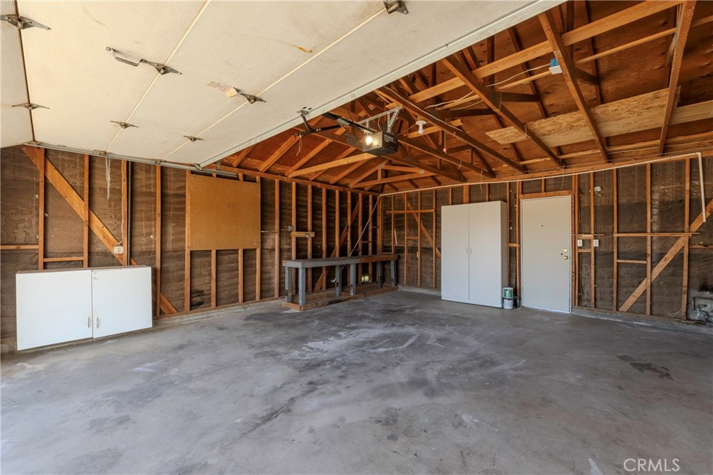 11135 Truchas Road Apple Valley, CA 92308 - Photo 29 of 35 a view of an empty room with floor to ceiling window