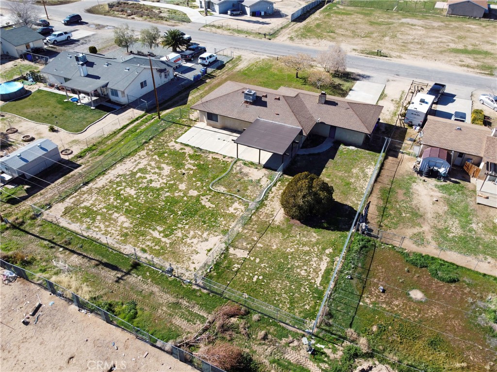 11135 Truchas Road Apple Valley, CA 92308 - Photo 31 of 35 an aerial view of a house with yard swimming pool and outdoor seating