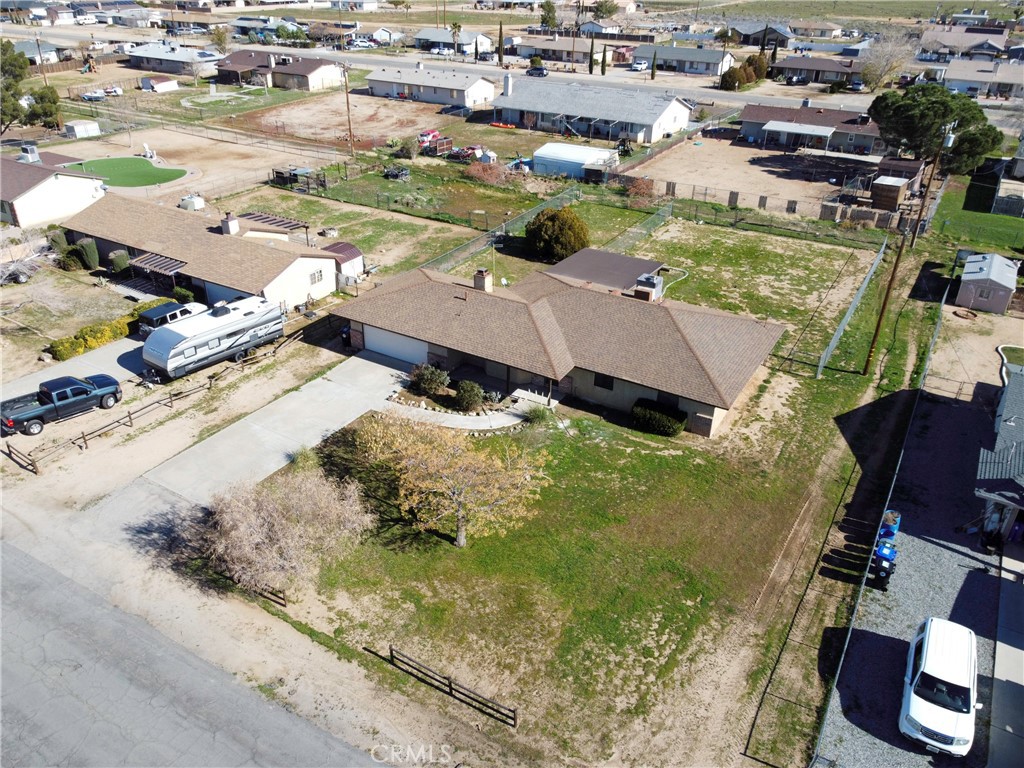 11135 Truchas Road Apple Valley, CA 92308 - Photo 32 of 35 an aerial view of residential houses with outdoor space