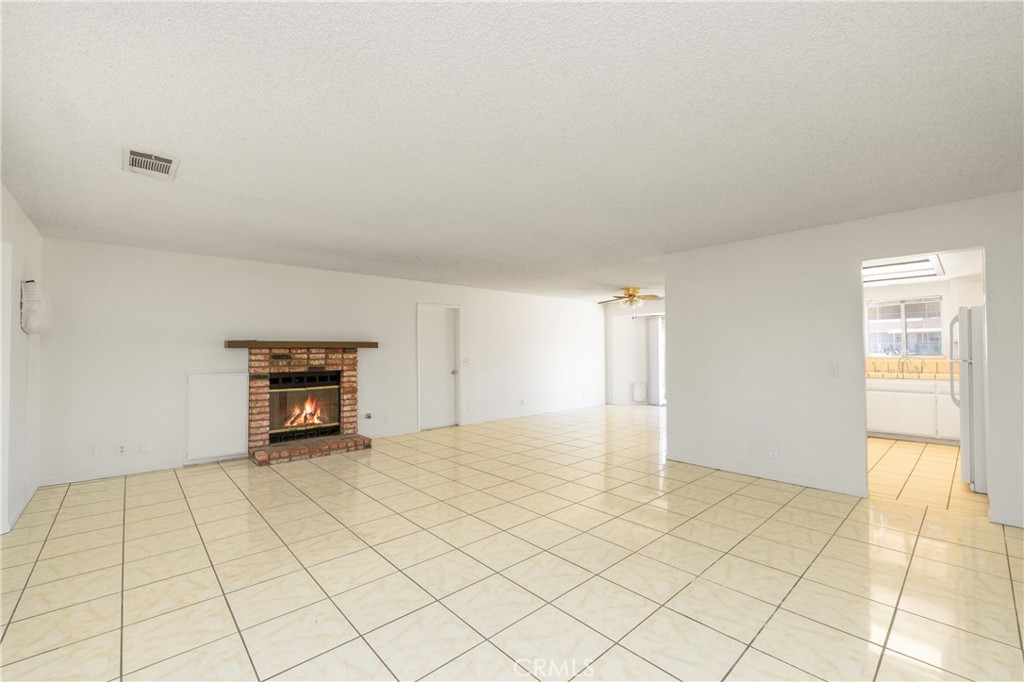 11135 Truchas Road Apple Valley, CA 92308 - Photo 4 of 35 a view of an empty room and window