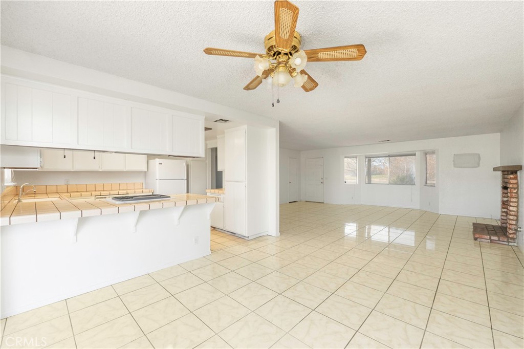 11135 Truchas Road Apple Valley, CA 92308 - Photo 9 of 35 a view of a room with a chandelier