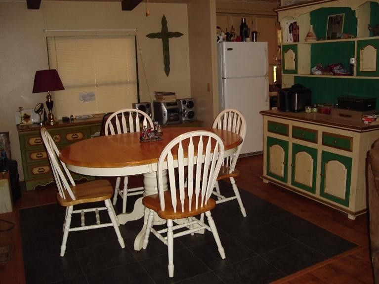1901 111th Street Lubbock, TX 79423 - Photo 5 of 10 a view of a dining room with furniture and wooden floor