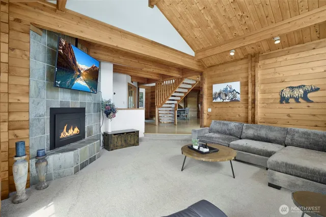 a bedroom with a bed and a fireplace