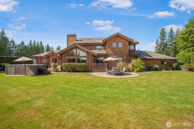 a view of a large body of water with a building in the background