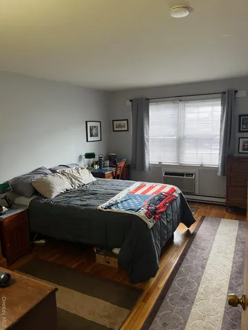 a bathroom with a sink toilet and vanity
