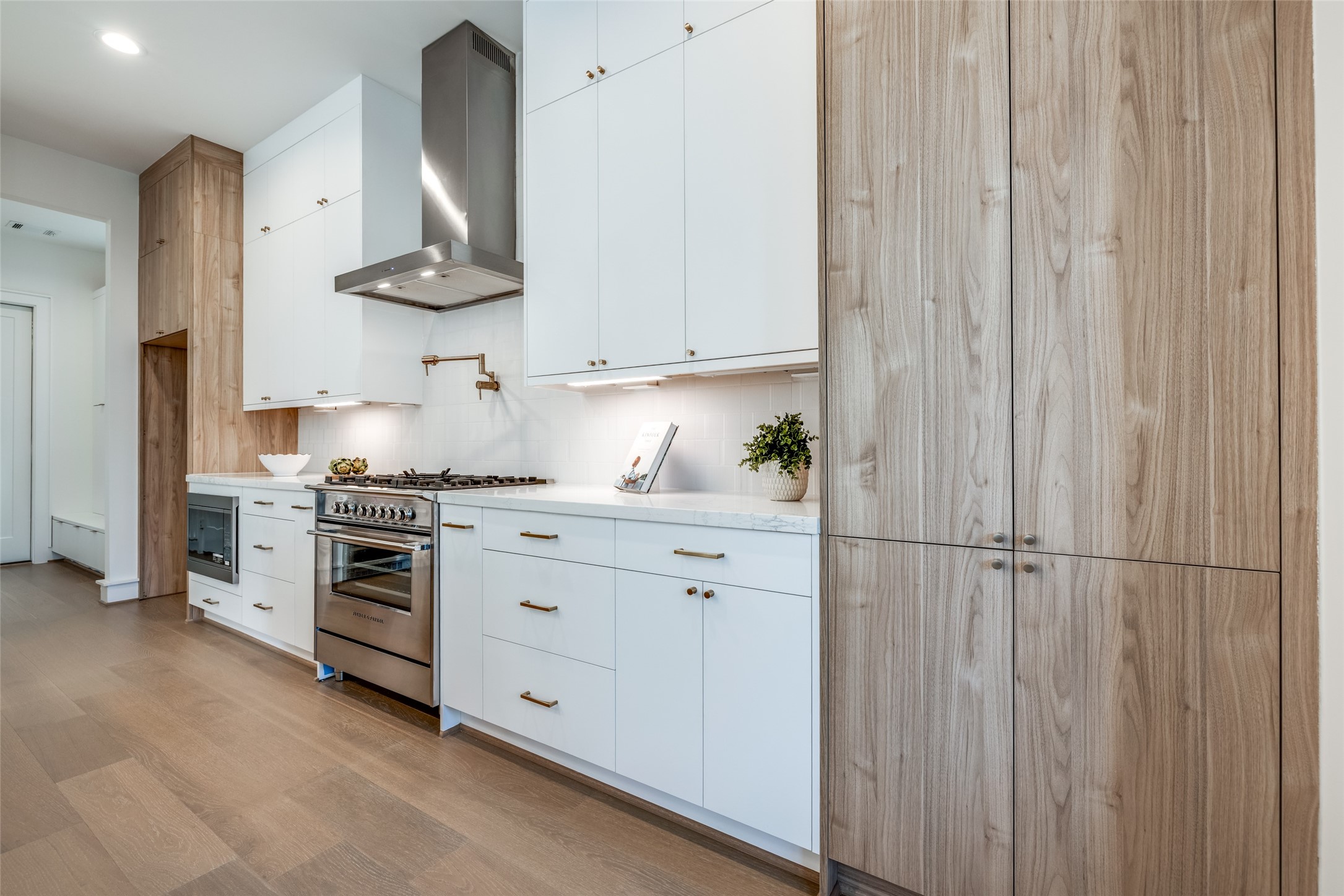 1601 Vermont Street Houston, TX 77006 - Photo 20 of 46 a kitchen with stainless steel appliances a refrigerator and cabinets