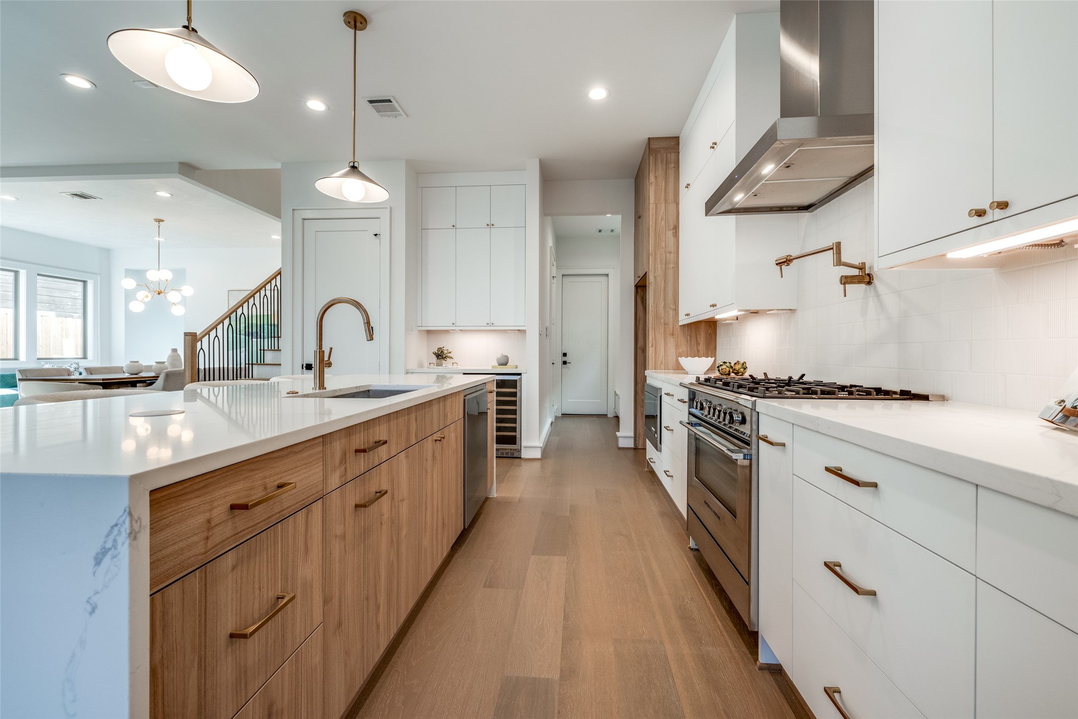 1601 Vermont Street Houston, TX 77006 - Photo 22 of 46 a large kitchen with stainless steel appliances a lot of counter space and a sink