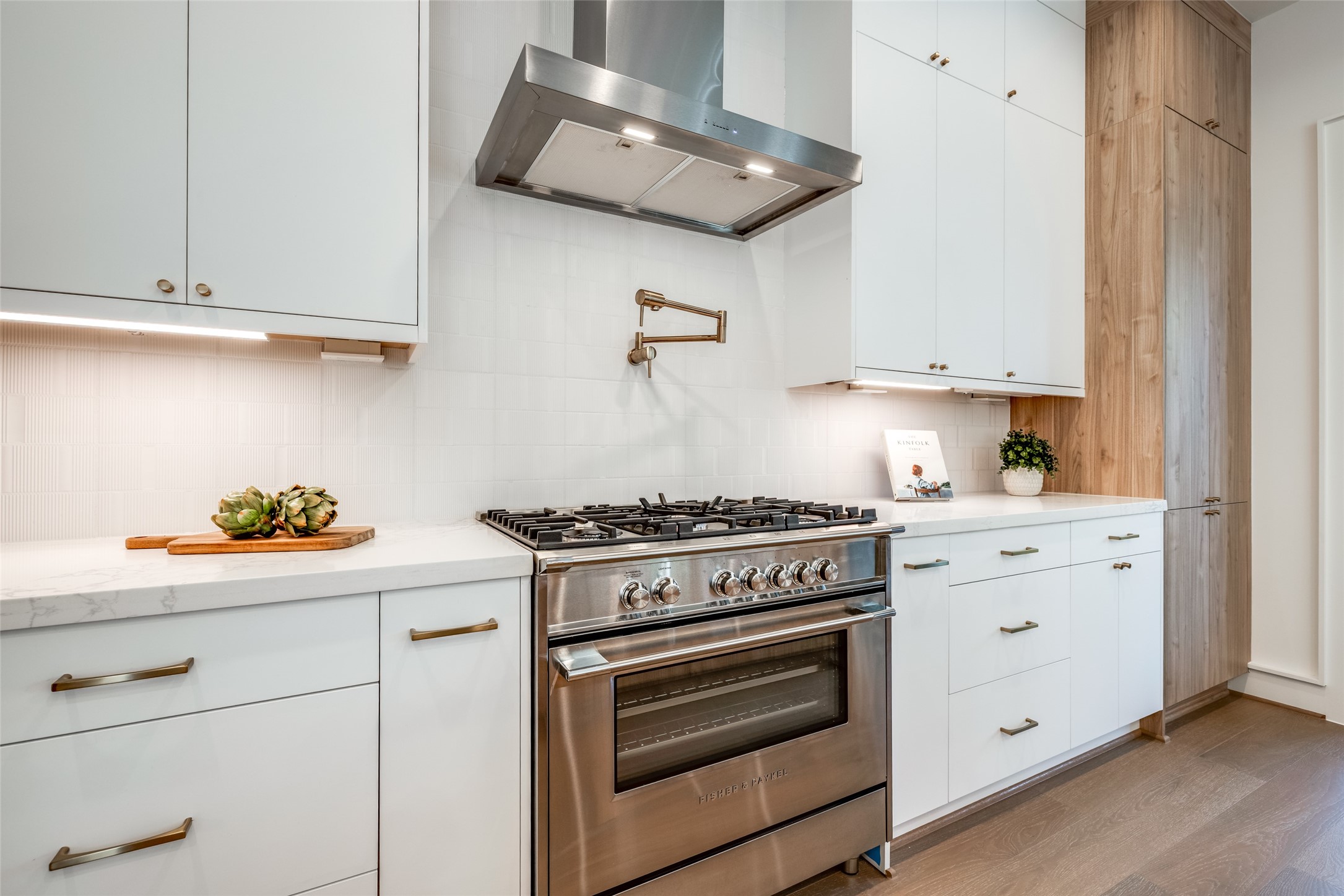 1601 Vermont Street Houston, TX 77006 - Photo 26 of 46 a kitchen with white cabinets and appliances