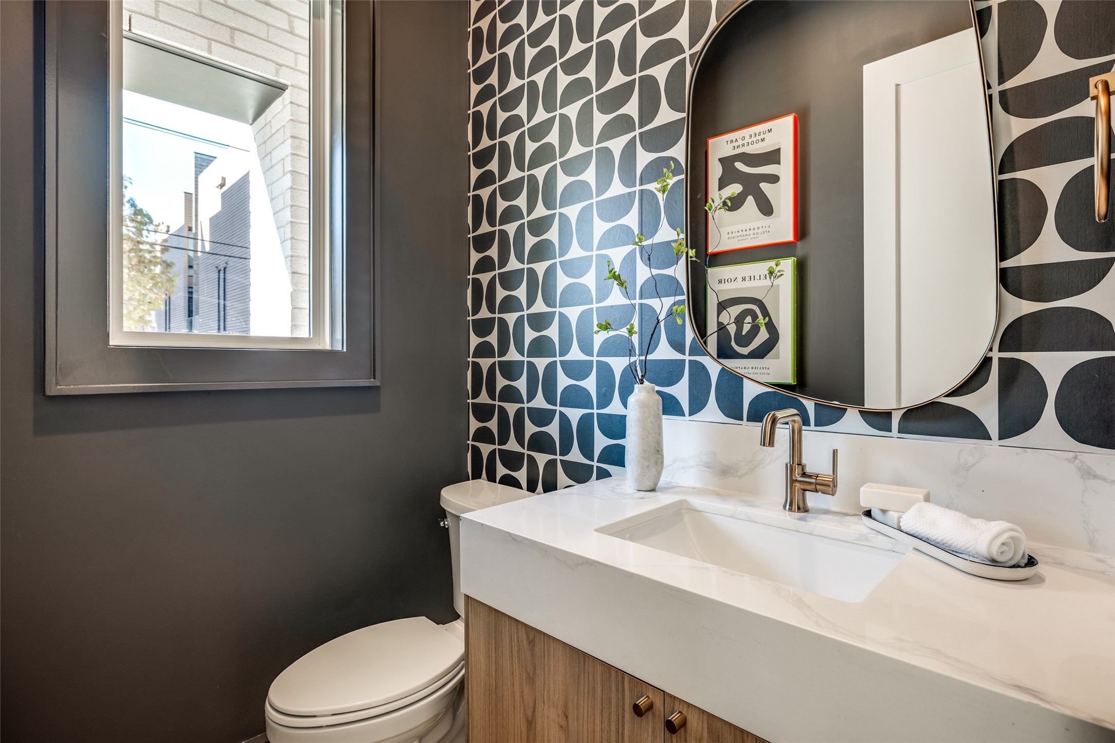 1601 Vermont Street Houston, TX 77006 - Photo 29 of 46 a bathroom with a sink and a toilet