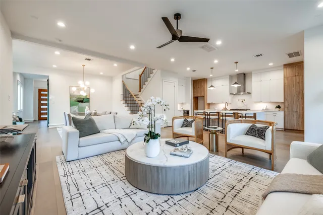 a kitchen with stainless steel appliances a refrigerator and cabinets