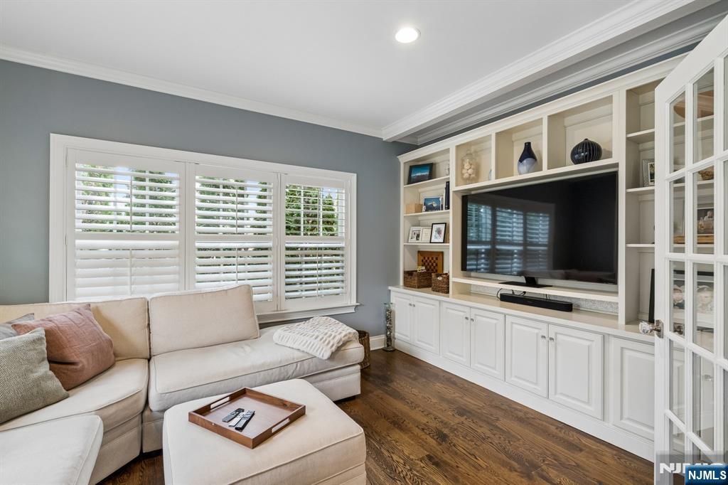 44 Millbrook Road New Vernon, NJ 07976 - Photo 13 of 45 a living room with furniture and a flat screen tv