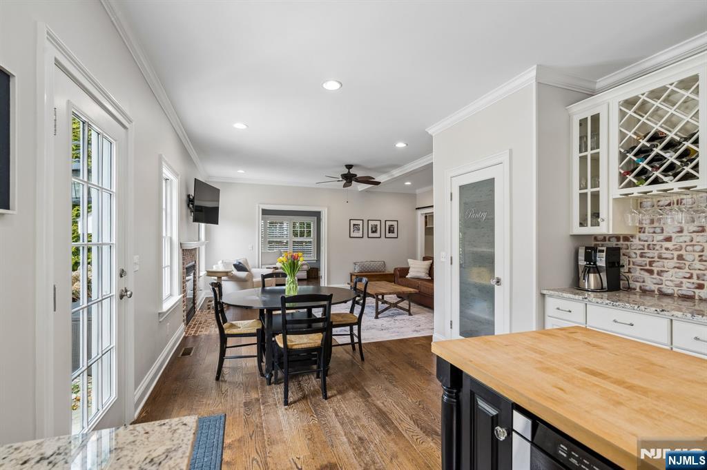 44 Millbrook Road New Vernon, NJ 07976 - Photo 17 of 45 a view of a dining room with furniture and wooden floor