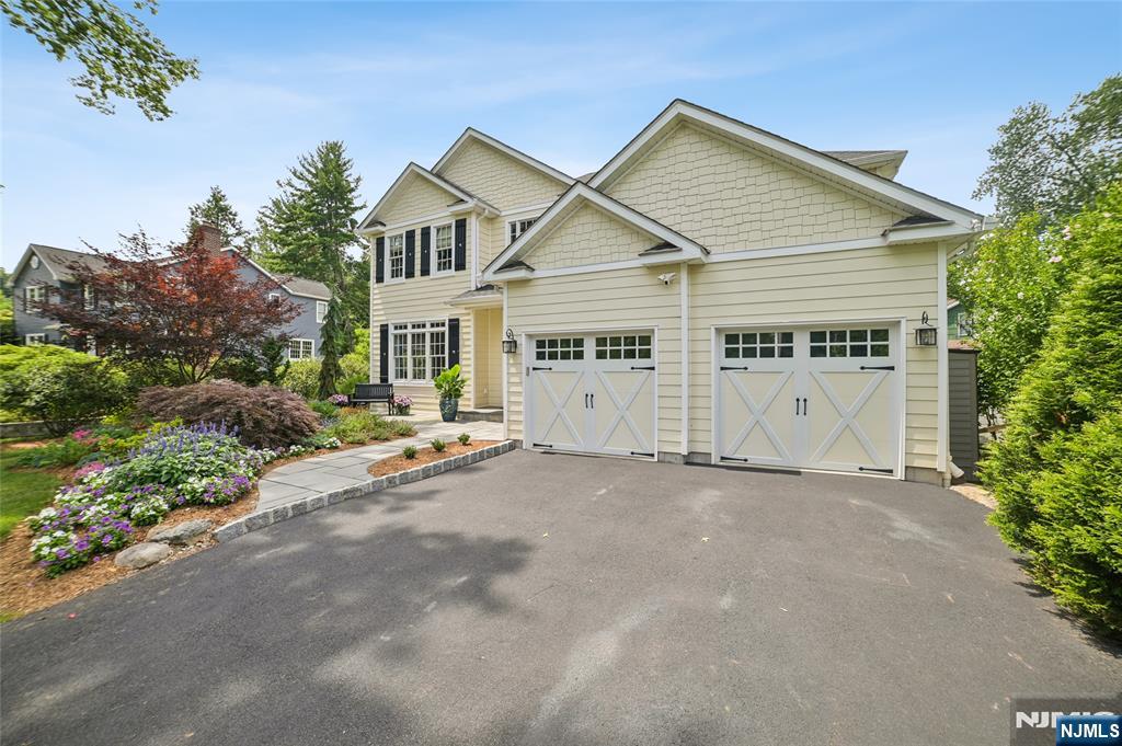 44 Millbrook Road New Vernon, NJ 07976 - Photo 2 of 45 a view of a house with a yard and potted plants