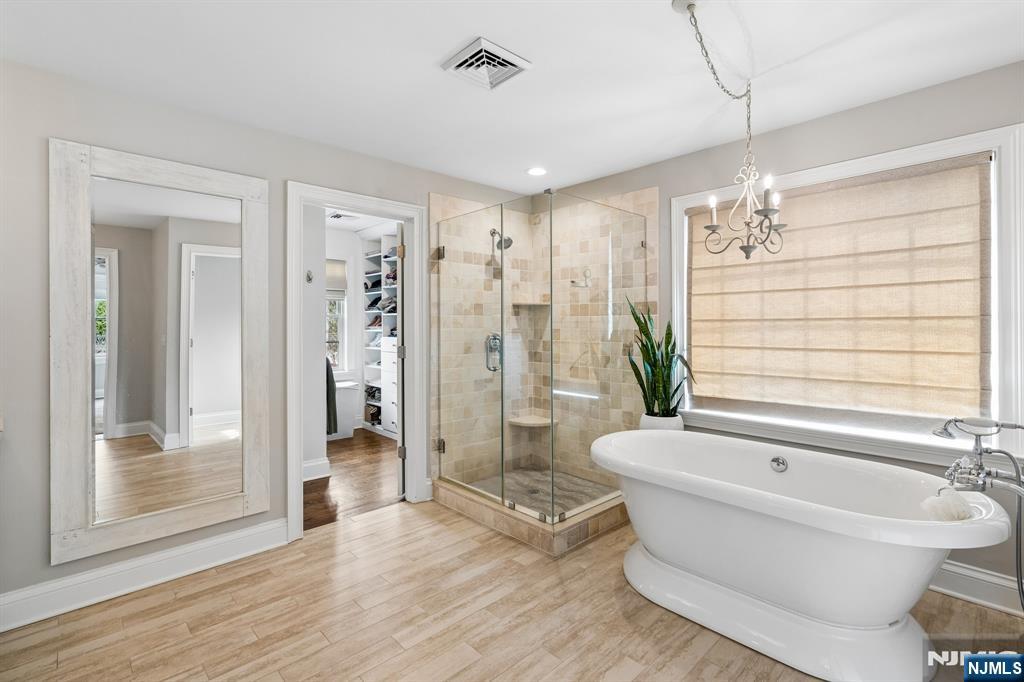 44 Millbrook Road New Vernon, NJ 07976 - Photo 23 of 45 a bathroom with a granite countertop sink a toilet and shower