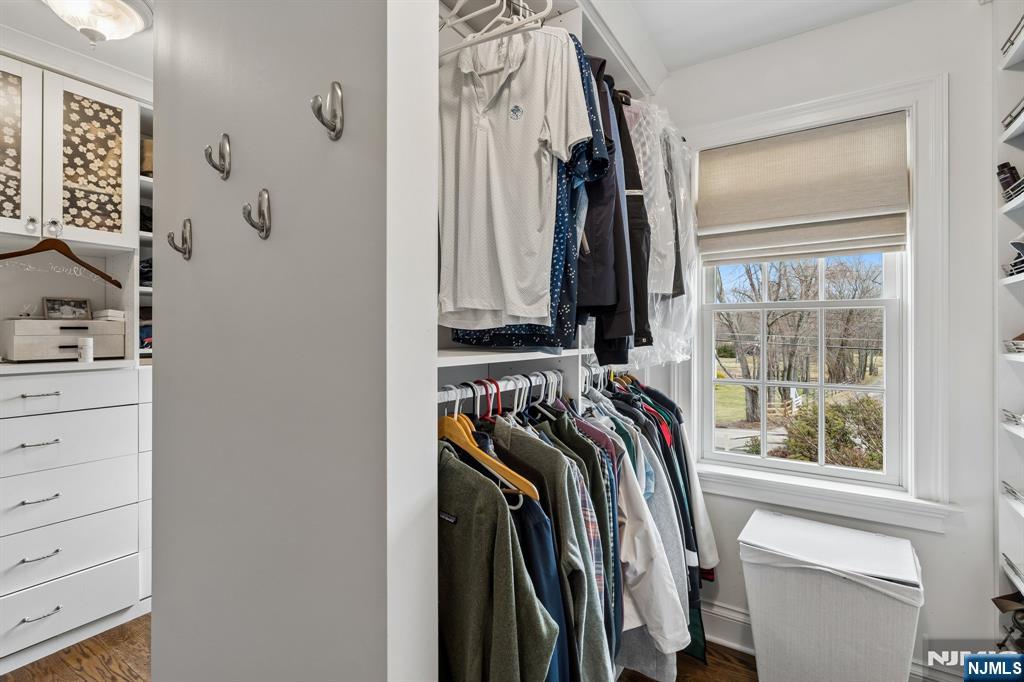 44 Millbrook Road New Vernon, NJ 07976 - Photo 26 of 45 a view of walk in closet with clothes and shoes