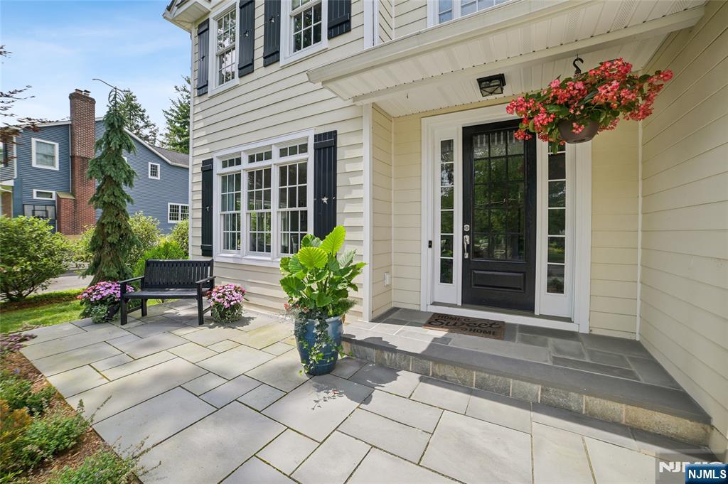 44 Millbrook Road New Vernon, NJ 07976 - Photo 3 of 45 a front view of a house with a porch