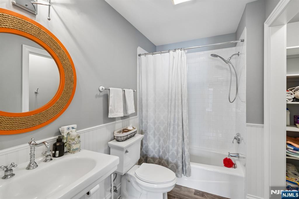 44 Millbrook Road New Vernon, NJ 07976 - Photo 33 of 45 a bathroom with a sink toilet and shower