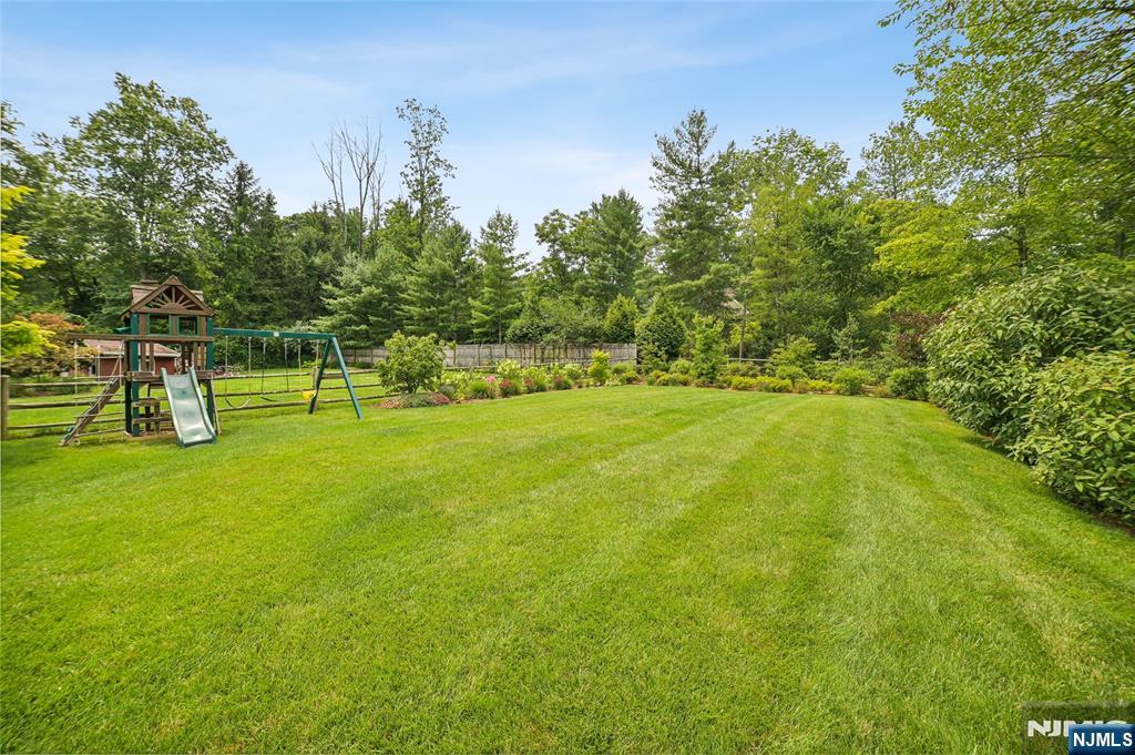 44 Millbrook Road New Vernon, NJ 07976 - Photo 42 of 45 a view of yard with swimming pool and green space