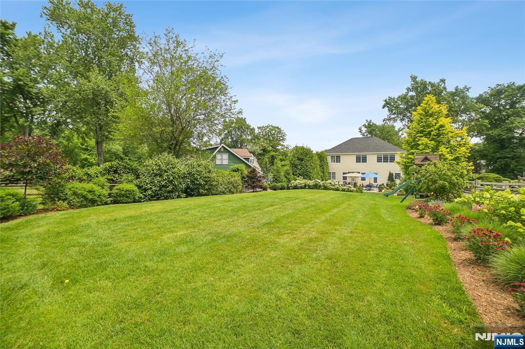 44 Millbrook Road New Vernon, NJ 07976 - Photo 44 of 45 a view of a big yard with large trees