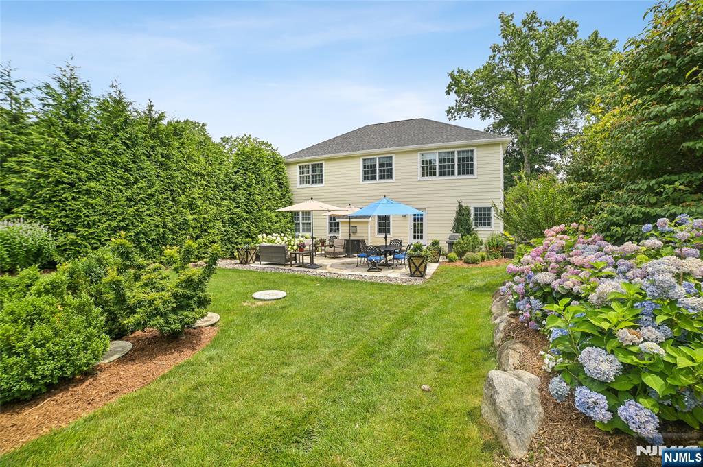 44 Millbrook Road New Vernon, NJ 07976 - Photo 45 of 45 a front view of a house with garden