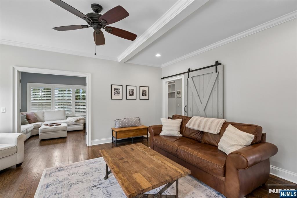 44 Millbrook Road New Vernon, NJ 07976 - Photo 10 of 45 a living room with furniture and a wooden floor