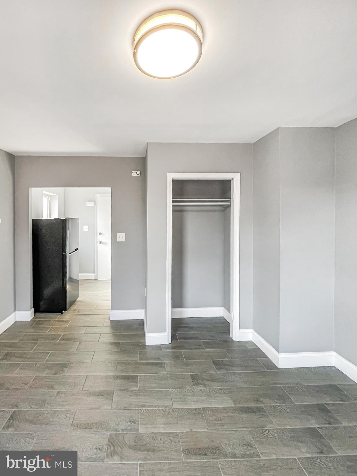 1434 Light Street Baltimore, MD 21230 - Photo 14 of 20 wooden floor in a hall with an entryway