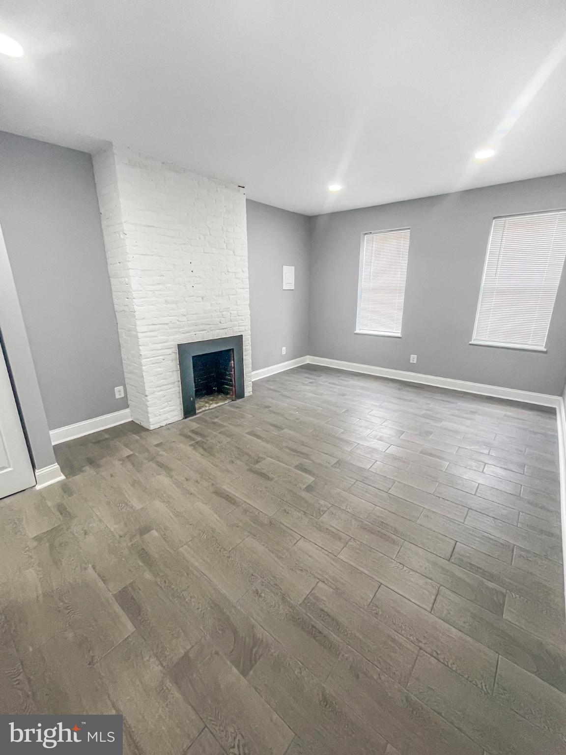 1434 Light Street Baltimore, MD 21230 - Photo 16 of 20 an empty room with windows