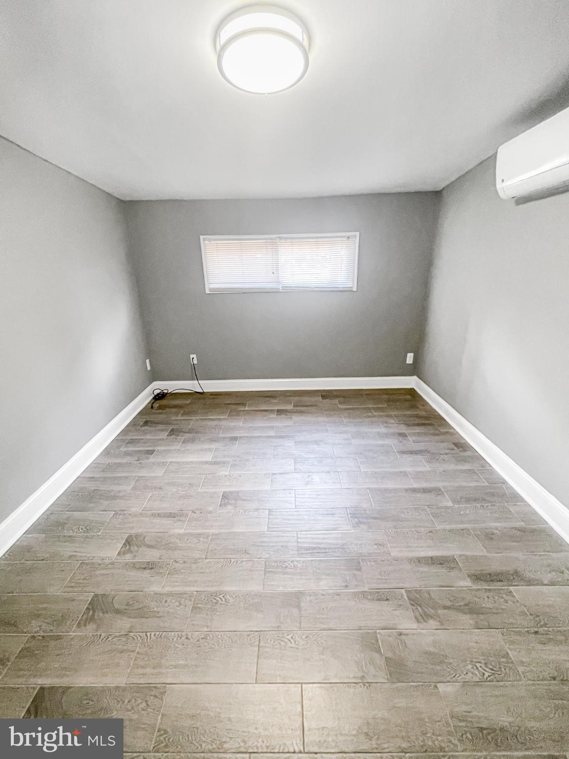 1434 Light Street Baltimore, MD 21230 - Photo 3 of 20 a view of empty room with window