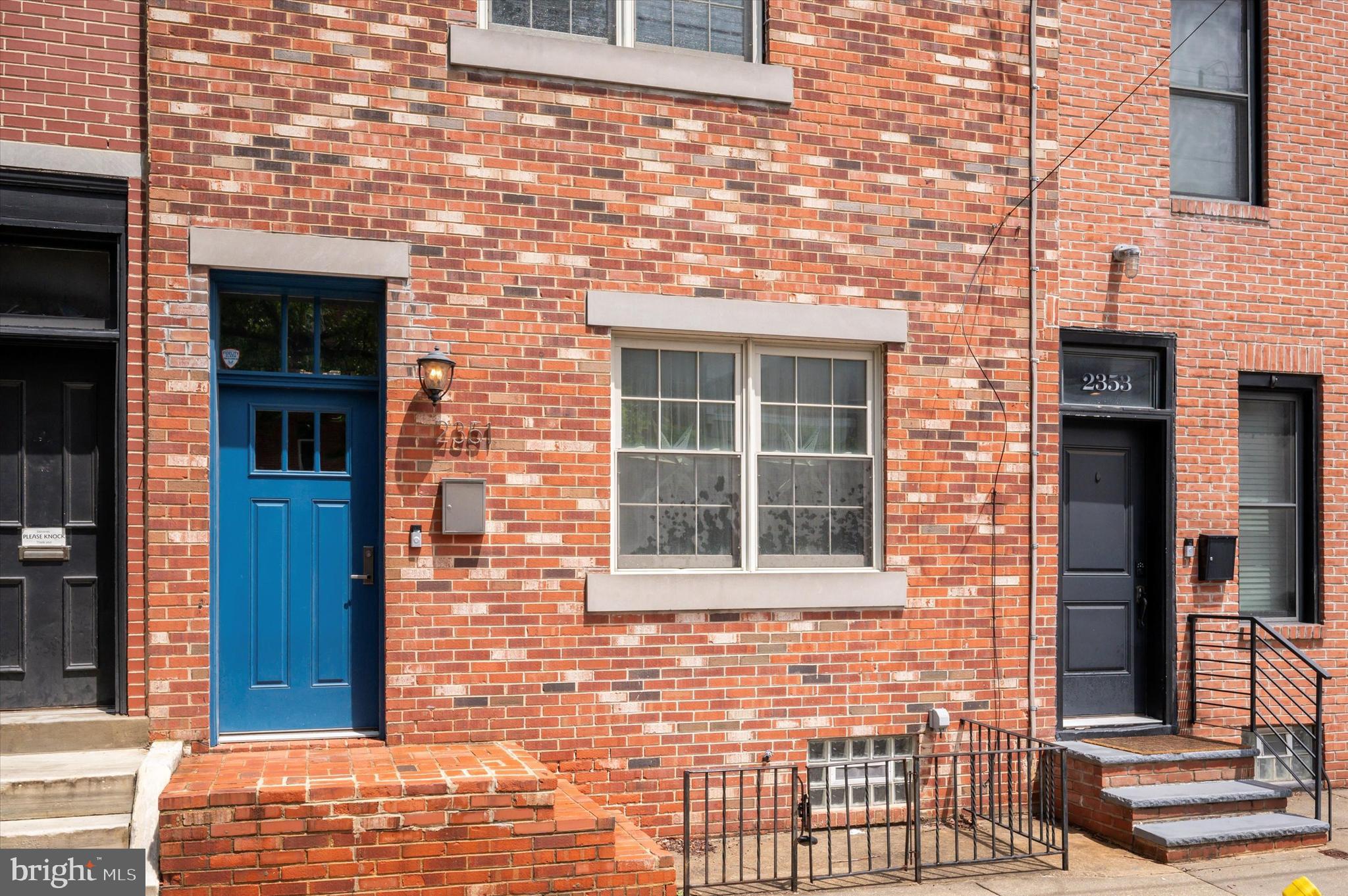 2351 East York Street Philadelphia, PA 19125 - Photo 1 of 44 a front view of a house with a window