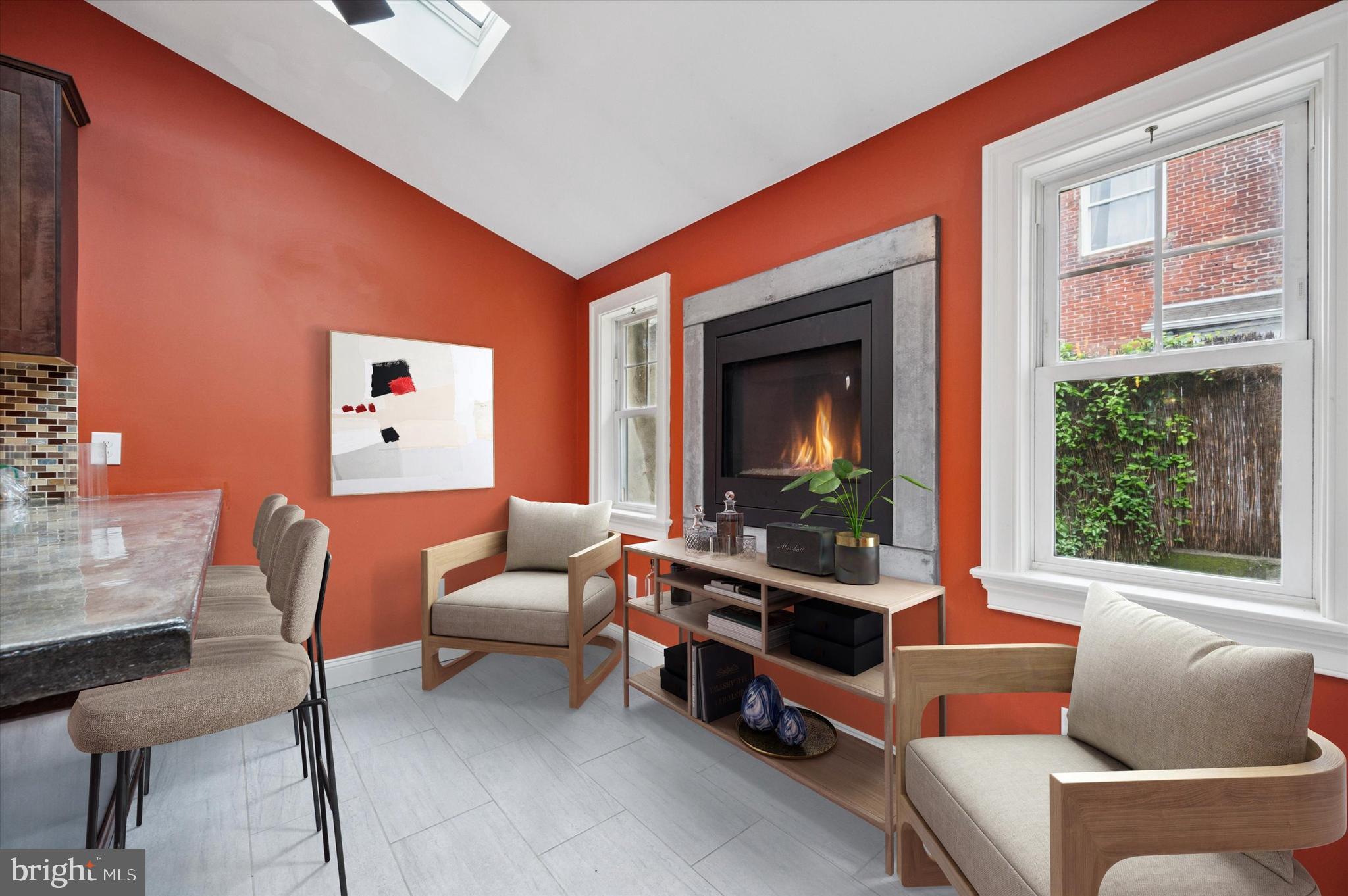 2351 East York Street Philadelphia, PA 19125 - Photo 14 of 44 a living room with furniture a flat screen tv and a window