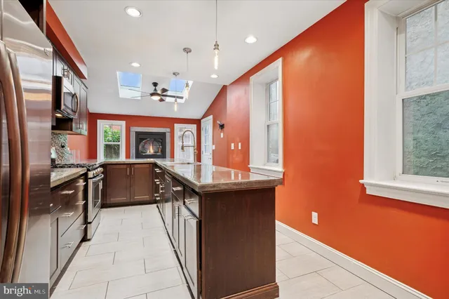 a lobby with furniture and window