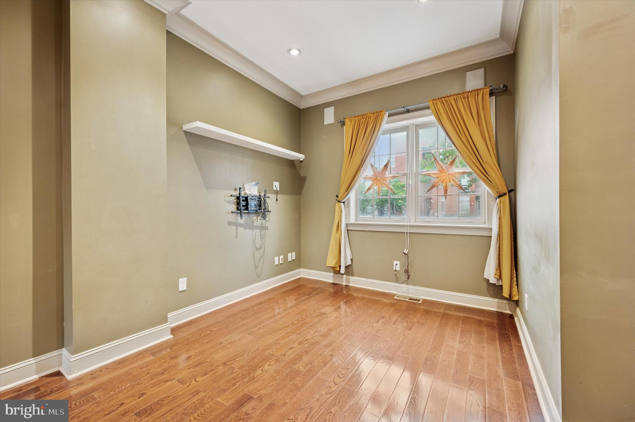 2351 East York Street Philadelphia, PA 19125 - Photo 5 of 44 an empty room with large windows