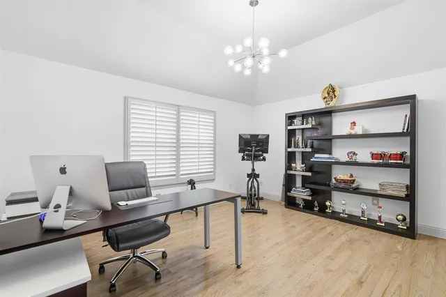 a workspace with furniture and window