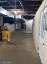 a view of an empty room with windows