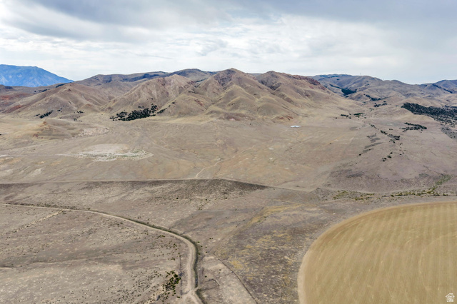 12800 South Crooked Cyn Road South Elberta, UT 84626 - Photo 34 of 48 Expansive undeveloped land featuring rolling hills and distant mountains