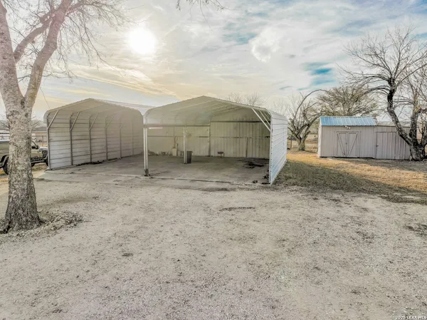 a view of a terrace with wooden floor and city view