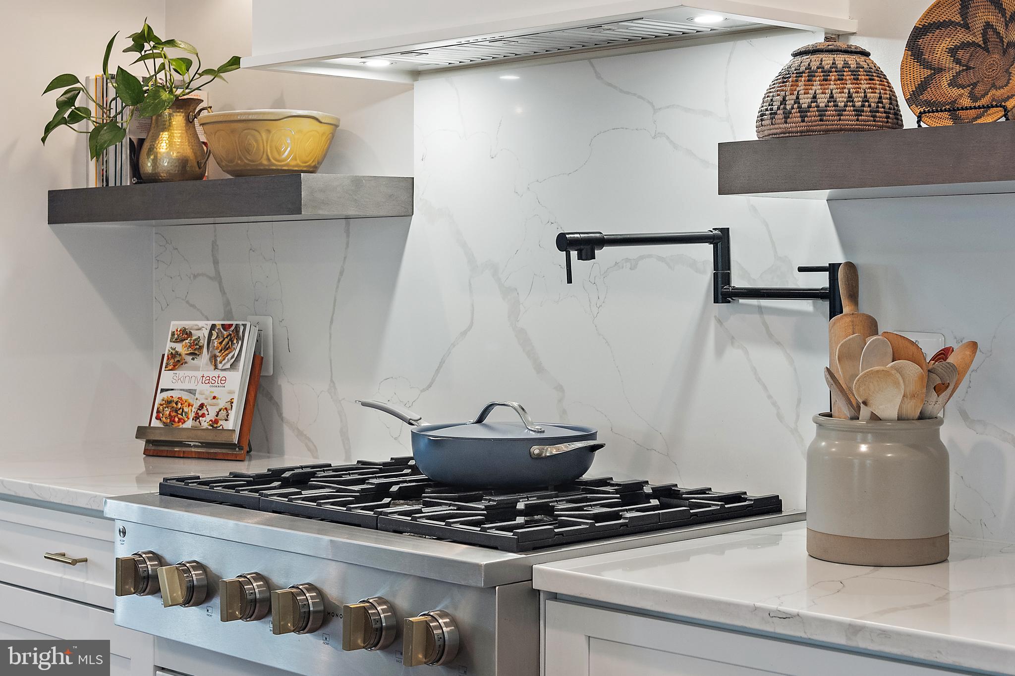 4929 West Chalk Point Road West River, MD 20778 - Photo 18 of 50 Custom hood vent; designer finishes, pot filler